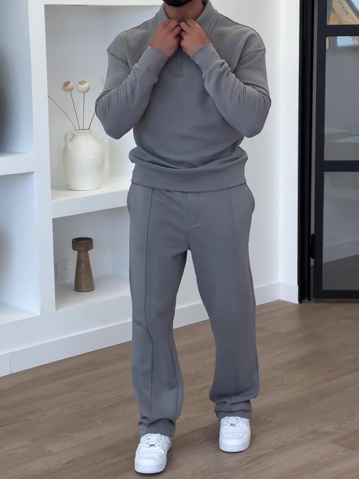 Modern men’s two-piece lounge set featuring a quarter-zip pullover and matching pants