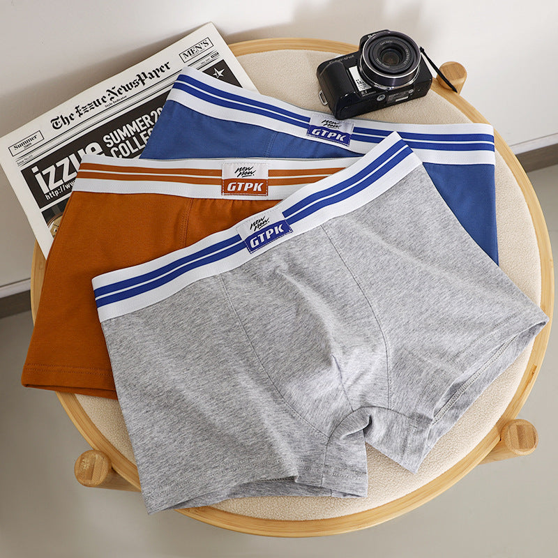 Soft men’s boxer briefs with a supportive stretch fit, breathable comfort, and athletic striped waistband