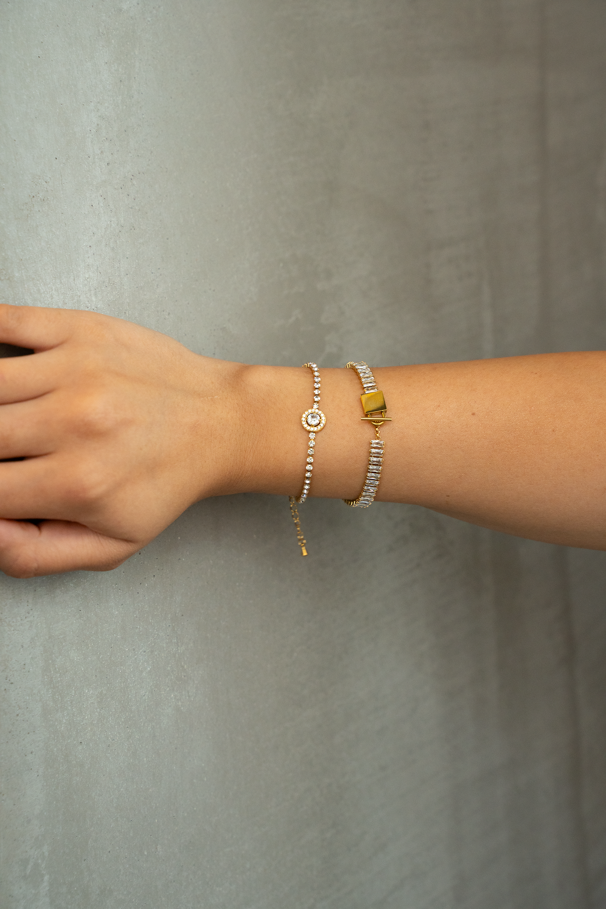 A little sparkle that pulls the whole look together- Gold-Tone Halo NORA Tennis Bracelet