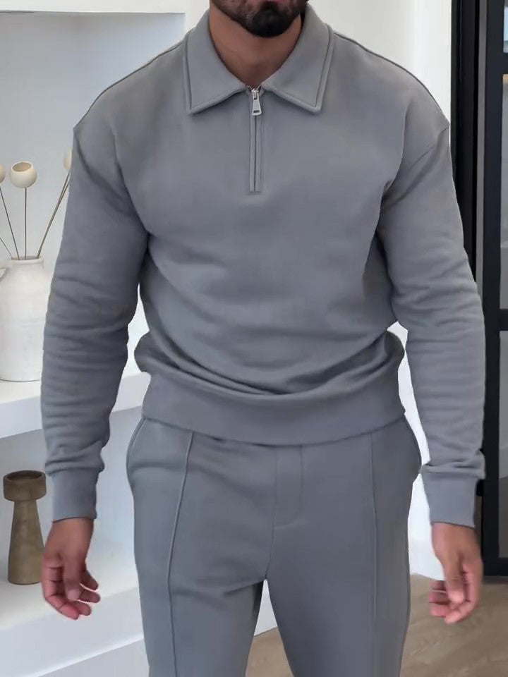 Modern men’s two-piece lounge set featuring a quarter-zip pullover and matching pants
